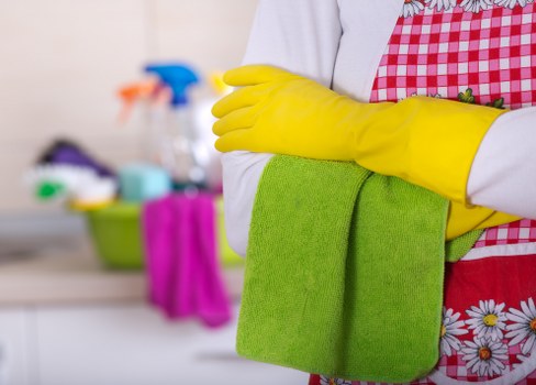 Local cleaner preparing an Airbnb apartment near Shoreditch for new guests