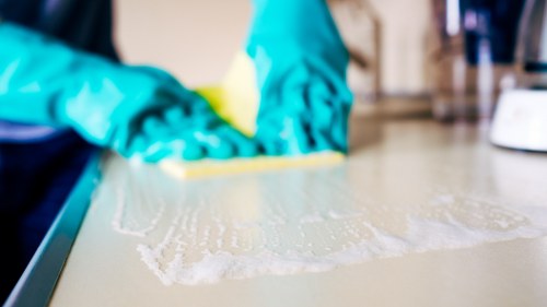 Deep cleaning of office carpet tiles in a Shoreditch workspace
